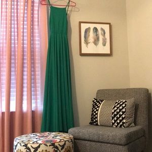 Open back, emerald green dress.